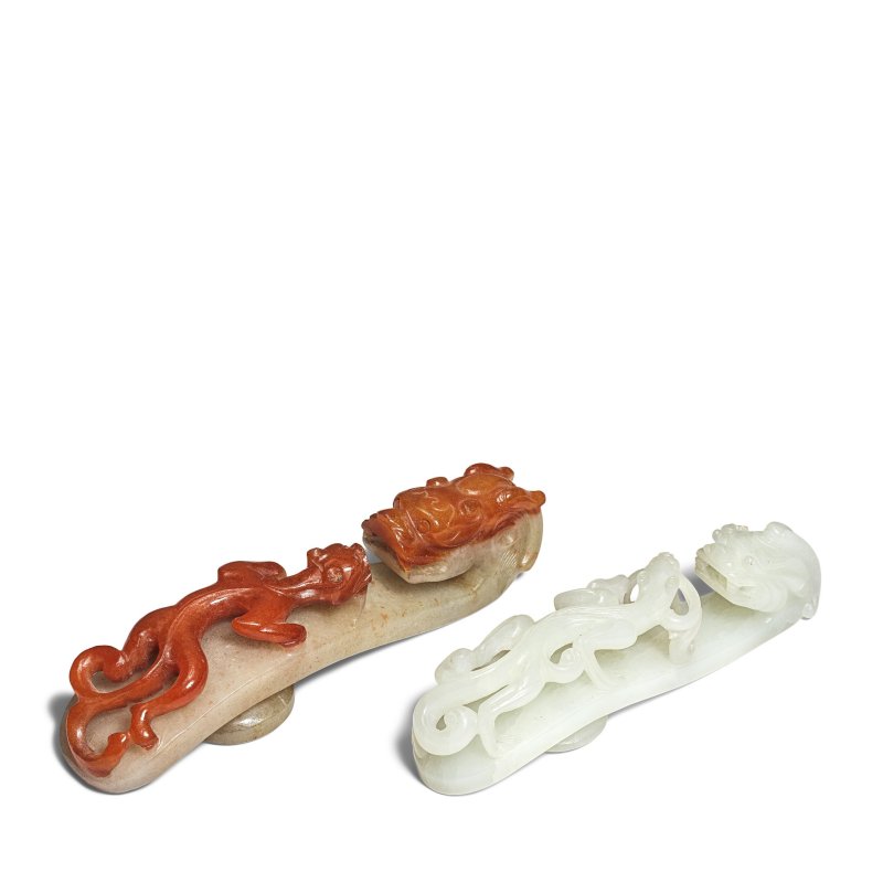 清 紅翡翠螭龍紋帶鉤及白玉螭龍紋帶鉤 | A RED JADEITE 'CHILONG' BELT HOOK AND A WHITE JADE 'CHILONG' BELT HOOK