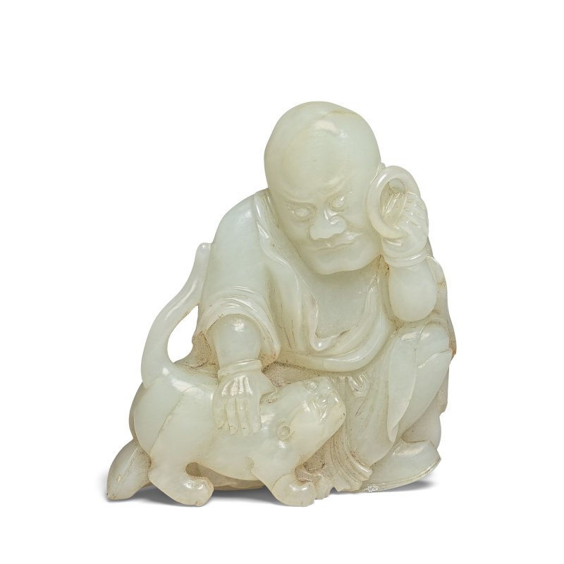 清 玉雕伏虎羅漢 | A CELADON AND RUSSET JADE 'PINDOLA' CARVING