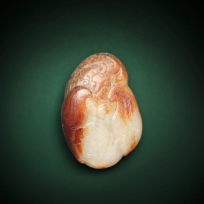 明/清早期 玉鳳凰鎮紙 | A PALE GREEN AND RUSSET 'PHOENIX' PAPER WEIGHT - 图1