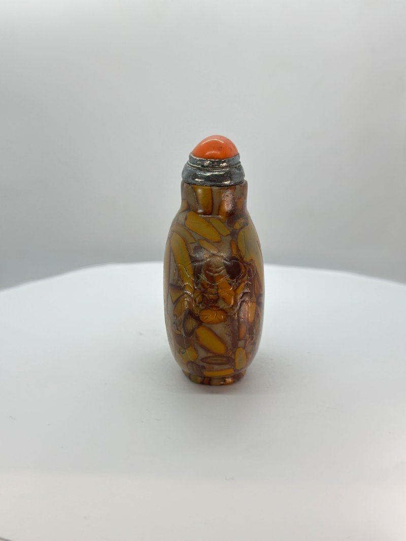 清十八/十九世紀 抱子石素面鼻煙壺、珊瑚蓋 | A PUDDINGSTONE SNUFF BOTTLE - 图4