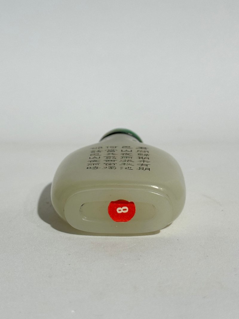 1750-1850 白玉填黑彩蘭紋詩文鼻煙壺、翡翠蓋 | A WHITE JADE 'ORCHID' SNUFF BOTTLE - 图6