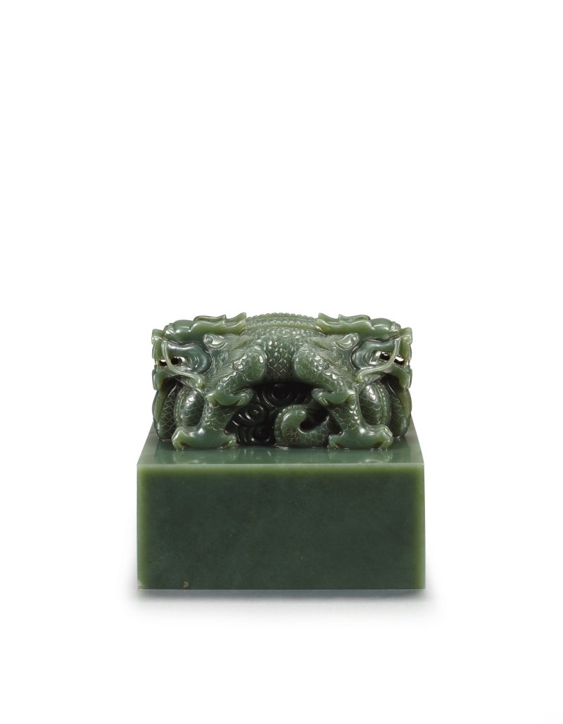 A large spinach-green jade 'dragon' seal with Manchu and Chinese inscriptions, Qing dynasty, Guangxu period | 清光緒 碧玉交龍鈕滿漢文孝穆成皇后尊謚寶璽 印文：孝穆溫厚莊肅端誠恪惠寬欽孚天裕聖成皇后之寶