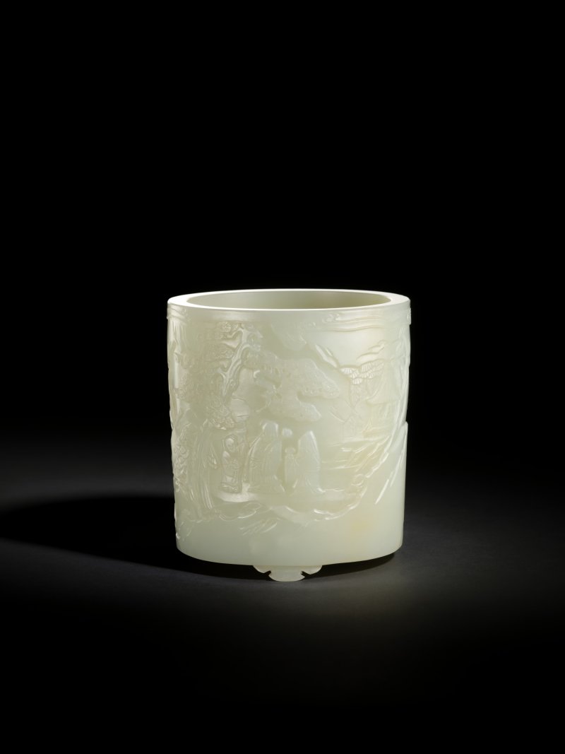 A finely carved white jade ‘immortals’ brushpot, Qing dynasty, 18th century | 清十八世紀　白玉雕松下高士圖筆筒