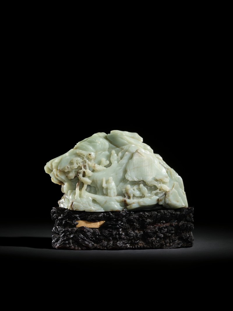 A large imperially inscribed celadon jade ‘gathering jade ’ boulder Qianlong period, dated to the Jimao year, corresponding to 1759 | 清乾隆 青玉御題詩採玉圖大山子 《乾隆己卯秋御製》款