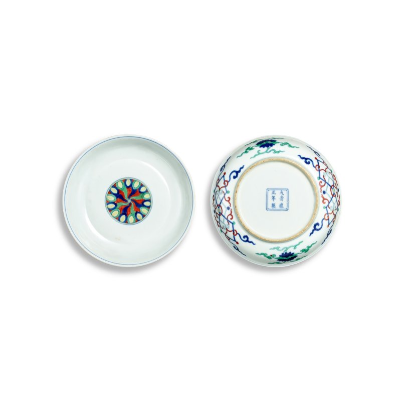 A fine pair of doucai 'lozenges and medallion' dishes, Marks and period of Yongzheng | 清雍正　鬪彩外纏枝花卉內輪花紋盤一對　《大清雍正年製》款