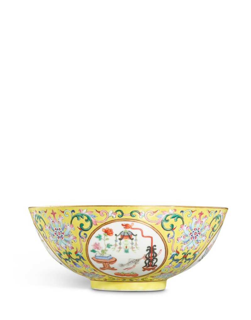 A yellow-ground famille-rose 'medallion' bowl, Shende Tang hall mark, Qing dynasty, Daoguang period | 清道光 黃地粉彩開光博古圖盌《慎德堂製》款