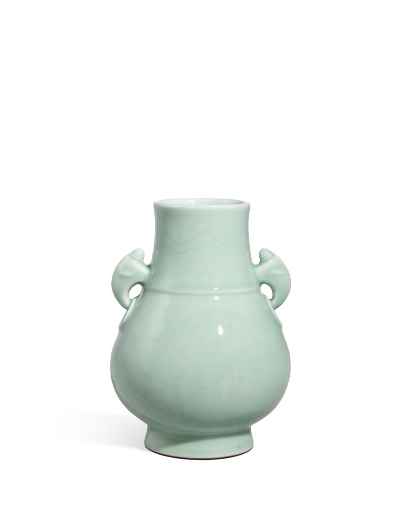A fine and rare archaistic carved celadon-glazed handled vase, Seal mark and period of Qianlong | 清乾隆　粉青釉仿古龍紋鳩首銜環耳尊　《大清乾隆年製》款