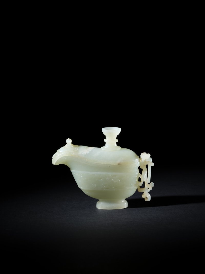 A white jade archaistic pouring vessel and cover, gong, Qing dynasty, Qianlong period | 清乾隆　白玉仿古螭龍柄觥