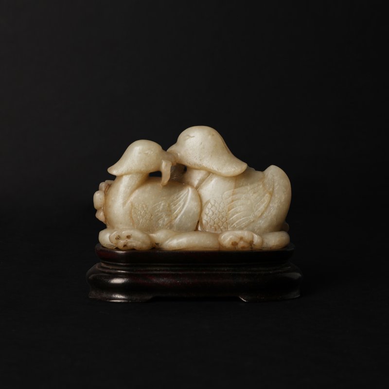 清十九世紀 青白玉雕鴛鴦連荷藕擺件 | A Chinese celadon and russet jade 'mandarin ducks' group, 19th century