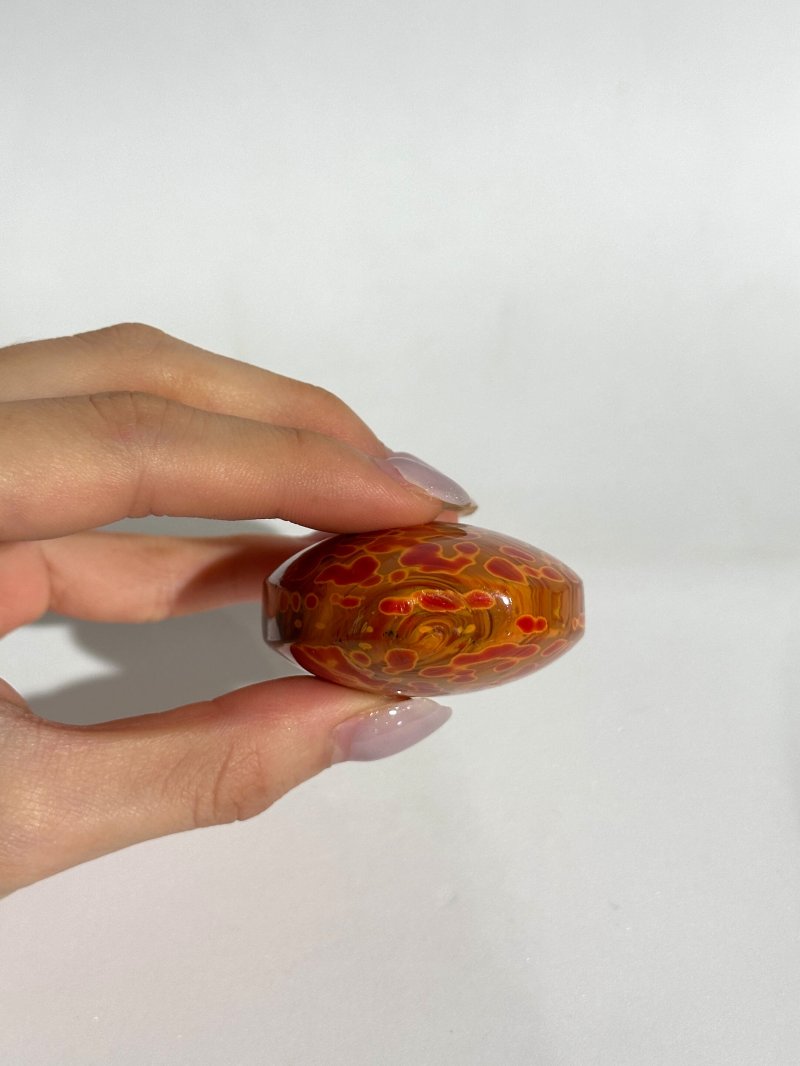 清十九世紀 玻璃胎仿雄黃鼻煙壺 | A GLASS SNUFF BOTTLE IMITATING REALGAR - 图2