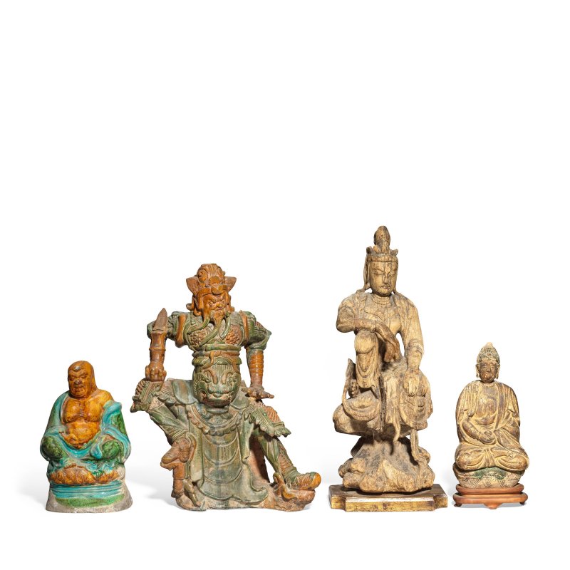 明至清 黃綠釉像兩件及木雕佛像兩件 | TWO GREEN AND YELLOW GLAZED FIGURES AND TWO CARVED WOOD FIGURES OF BUDDHA