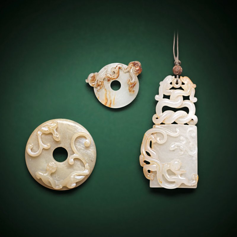 清或更晚 仿古玉璧兩件及鉞形珮一件 | THREE ARCHAISTIC JADE PENDANTS