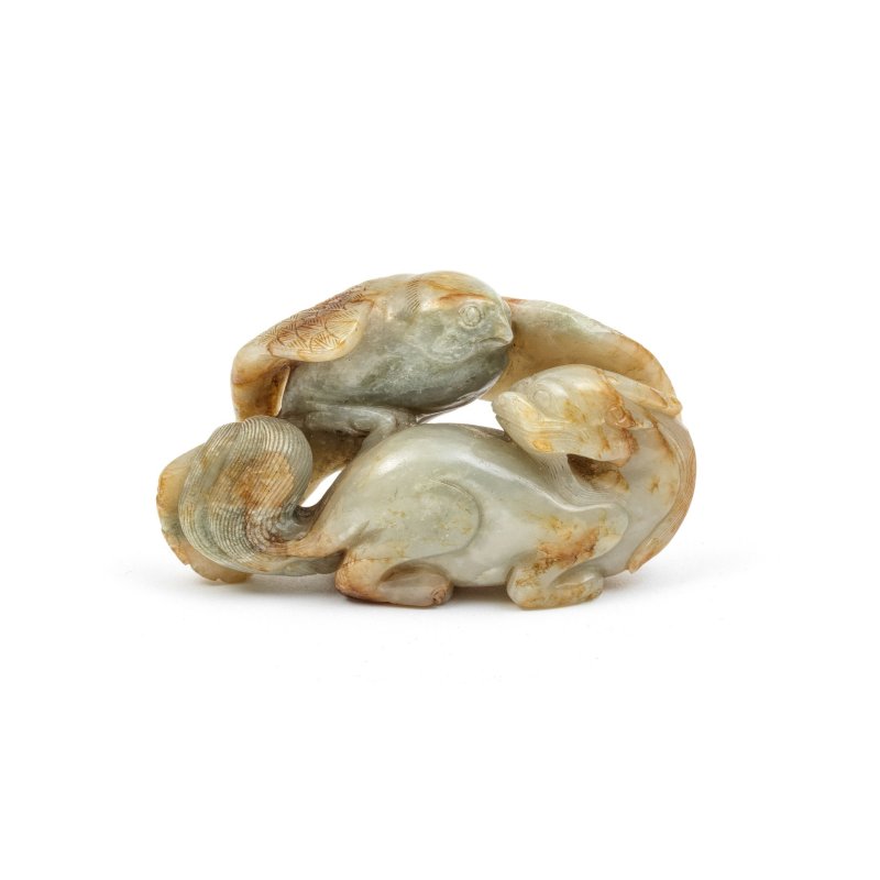 清 褐青玉鷹及瑞獸把件 | A GREEN AND RUSSET JADE 'HAWK AND MYTHICAL BEAST' GROUP