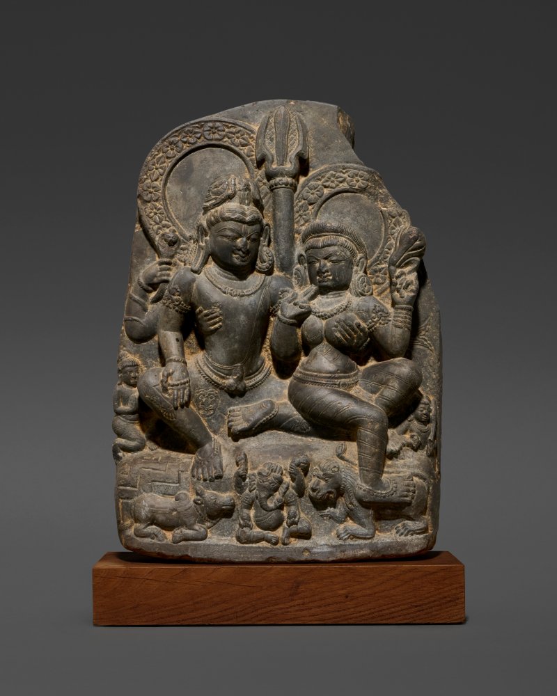 A BLACKSTONE STELE OF UMA MAHESHVARA  NORTHEAST INDIA, PRE-PALA PERIOD, CIRCA 7TH CENTURY - 图1