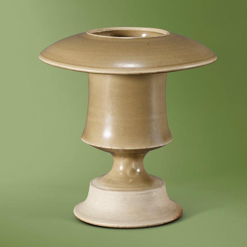 A YAOZHOU CELADON BURNER  CHINA, JIN DYNASTY (1115-1234)