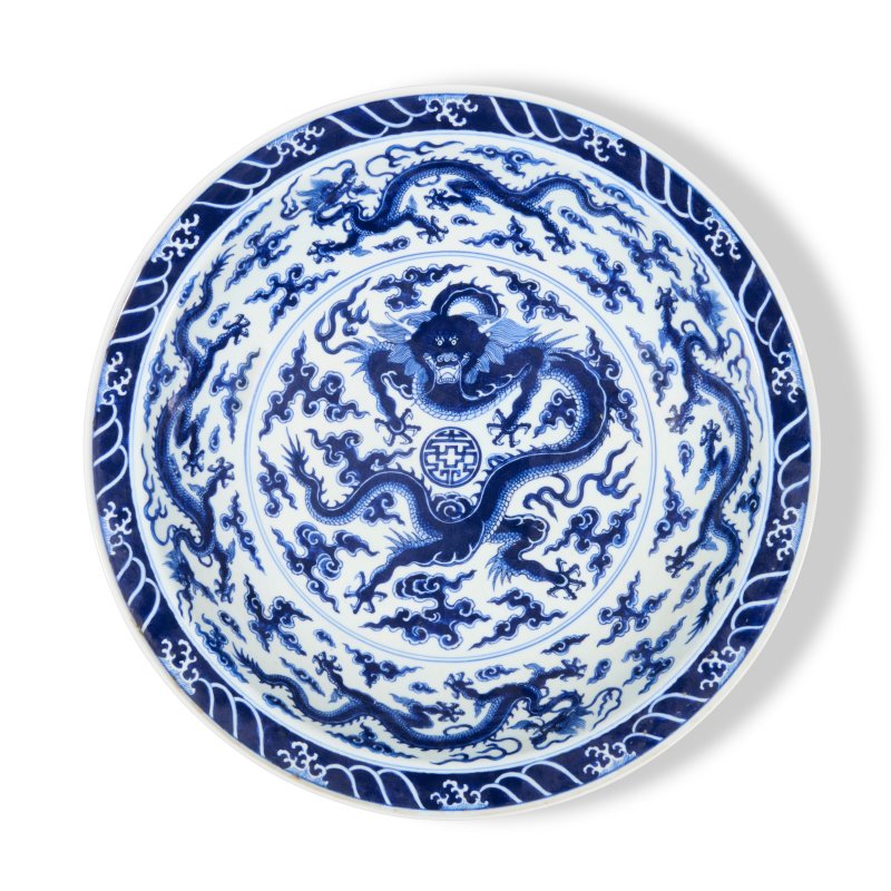 A RARE LARGE BLUE AND WHITE ‘DRAGON’ DISH  CHINA, QING DYNASTY, YONGZHENG SIX-CHARACTER MARK WITHIN A DOUBLE CIRCLE IN UNDERGLAZE BLUE AND OF THE PERIOD (1723-1735)