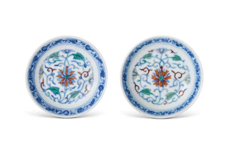 A FINE PAIR OF SMALL DOUCAI 'LOTUS' DISHES  CHINA, QING DYNASTY, QIANLONG SIX-CHARACTER SEAL MARKS IN UNDERGLAZE BLUE AND OF THE PERIOD (1736-1795)
