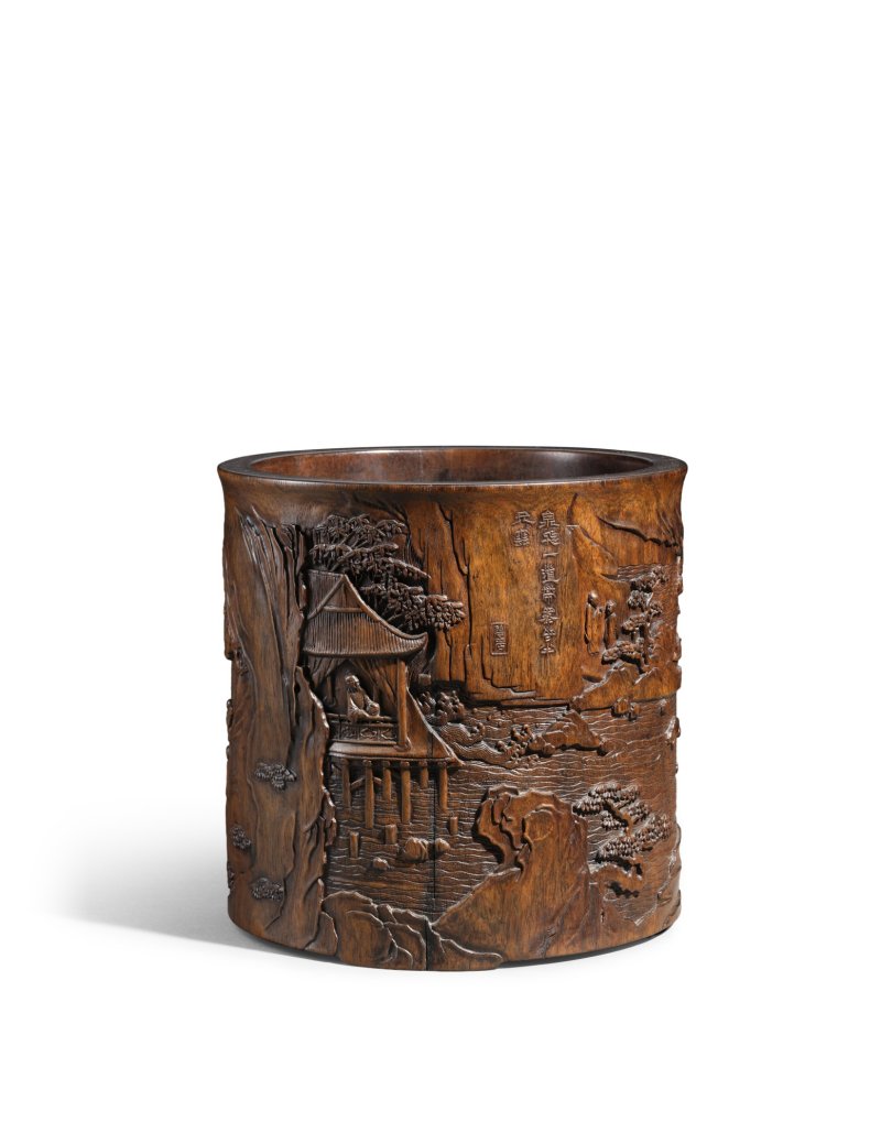 A large inscribed huanghuali ‘mountainscape’ brushpot, Qing dynasty, 18th century | 清十八世紀　黃花梨山水人物圖筆筒