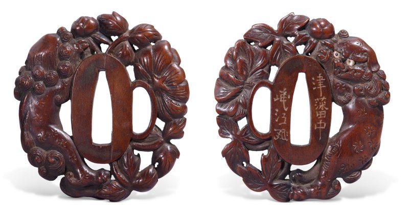 A LACQUERED-WOOD TSUBA (HAND GUARD FOR A DAGGER)  JAPAN, EDO PERIOD (LATE 18TH-EARLY 19TH CENTURY), SIGNED TSUHAN TANAKA MINKO WITH CURSIVE MONOGRAM (KAO) (TANAKA MINKO; 1735-1816)