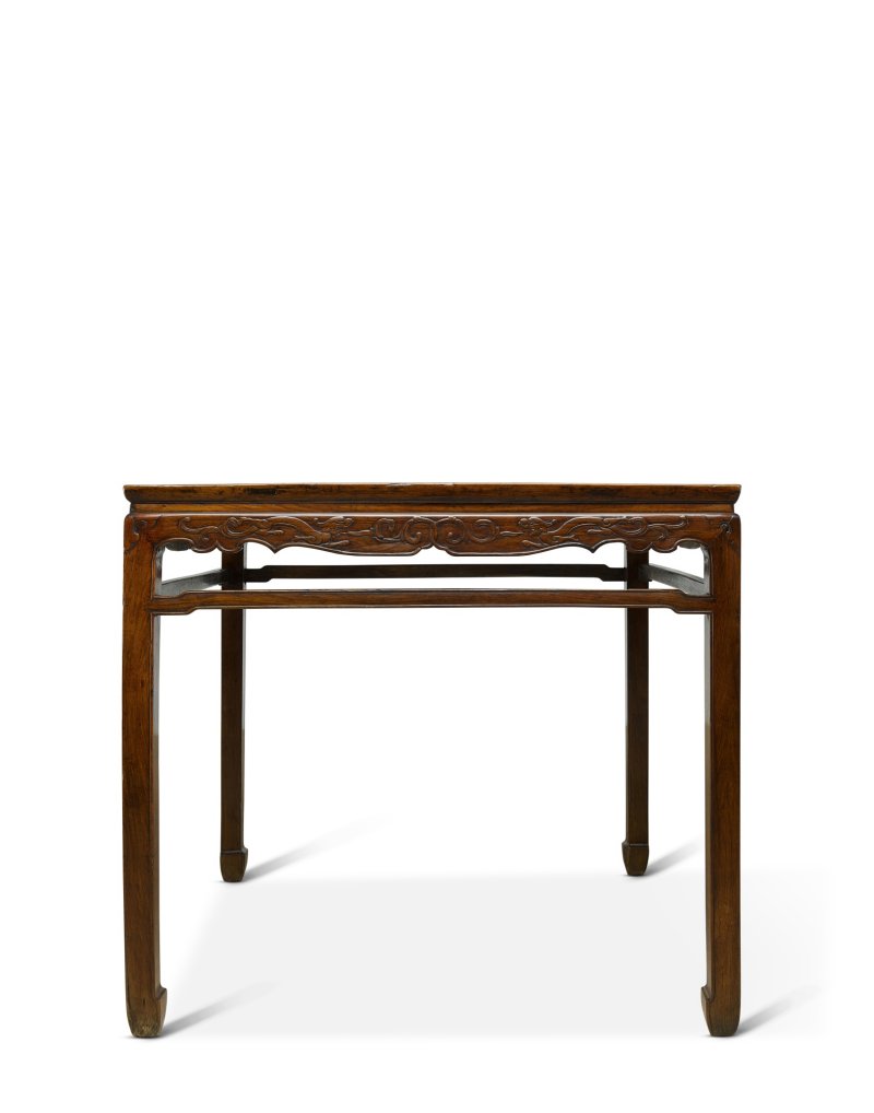 A huanghuali waisted square corner-leg table, Qing dynasty, 18th century | 清十八世紀　黃花梨螭龍紋束腰方桌 - 图1