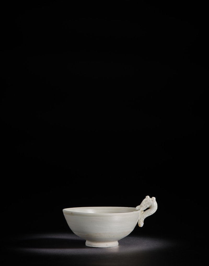 A small white-glazed dragon-handled cup, Northern Song dynasty | 北宋 白釉龍柄盃