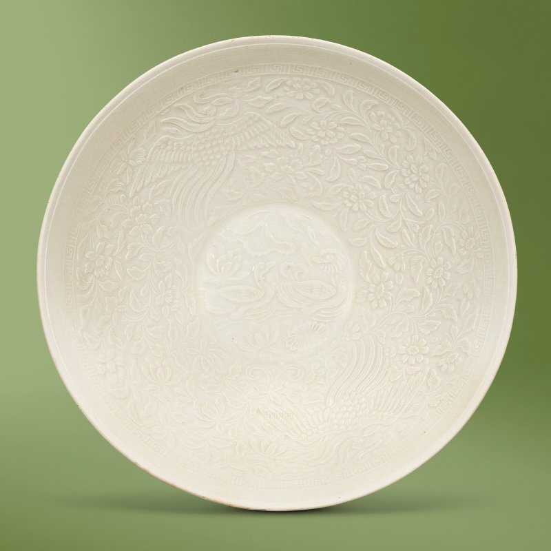 A WHITE-GLAZED MOULDED 'PHOENIX AND MANDARIN DUCKS' BOWL  CHINA, SOUTHERN SONG DYNASTY (1127-1279)