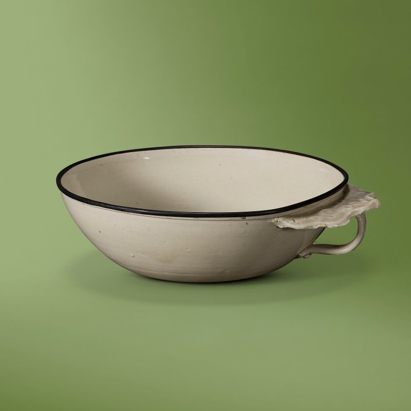 A RARE DING WHITE-GLAZED FOLIATE-HANDLED WASHER  CHINA, JIN DYNASTY (1115-1234)