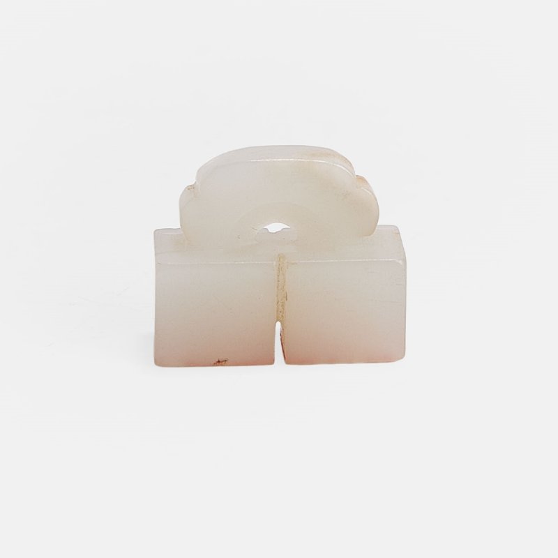 印文：百忍 | A Chinese jade double seal Ming dynasty (1368-1644), the two conjoined square seals surmounted by a ruyi-head-shaped handle