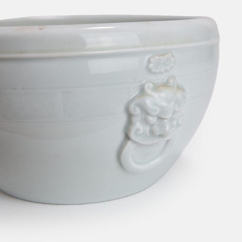 清 德化白釉铺首耳夔龙纹炉 | A Chinese blanc de Chine incense burner Qing dynasty (1644-1911) the tapering body rising to an inverted rim