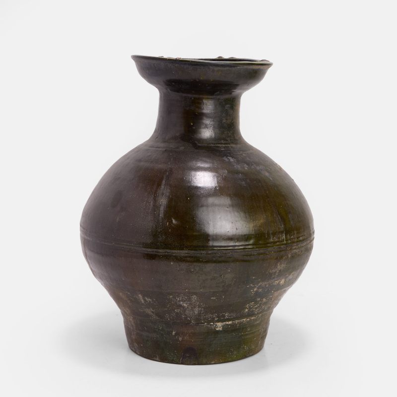 汉 绿釉弦纹盘口陶壶 | A Chinese lead-glazed earthenware vase Han dynasty (206 BCE - 220 CE), the bulbous body decorated with concentric bands