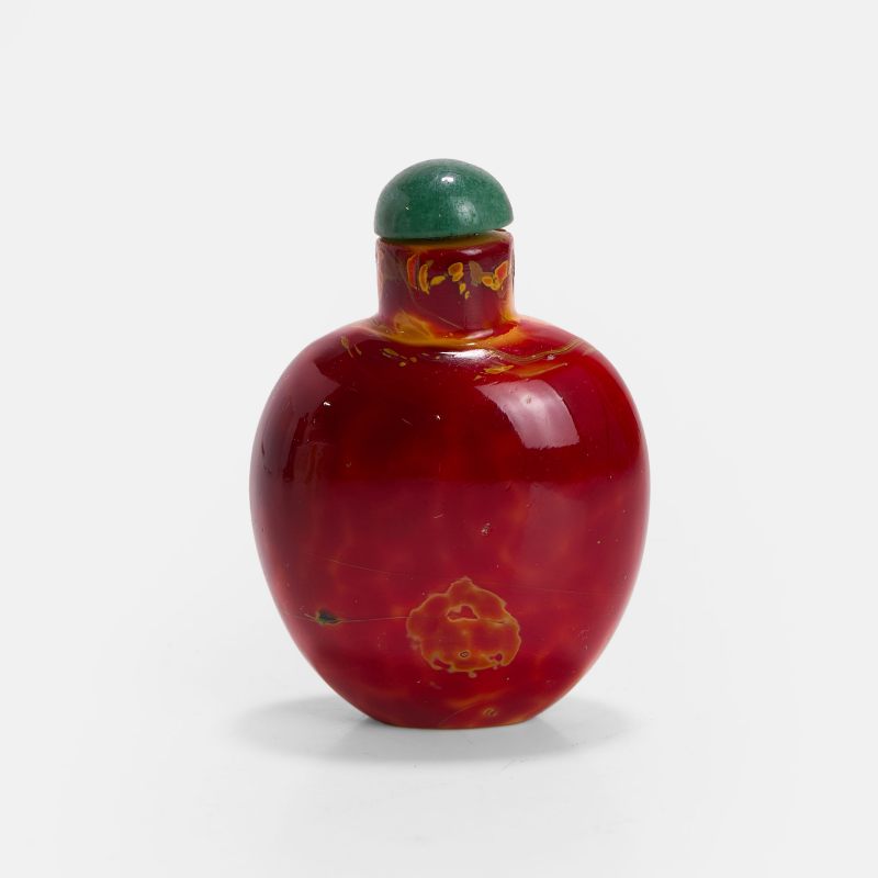 清十八至十九世纪 仿雄黄料胎鼻烟壶 | A Chinese realgar glass snuff bottle 18th-19th century, of gently tapering ovoid form with a concave base - 图2
