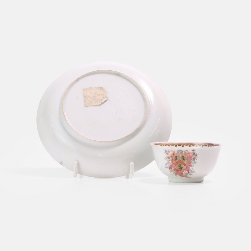 清十八世纪 外销粉彩徽章纹茶杯及碟 | A Chinese export famille rose armorial teacup and saucer 18th century, each of circular form