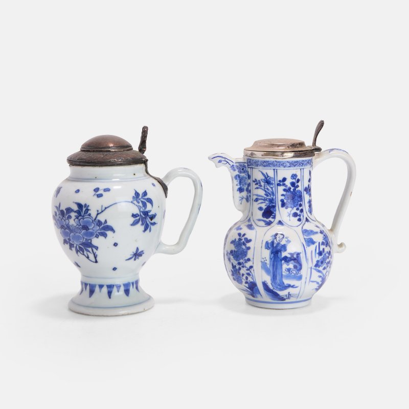 清康熙 青花人物花卉纹执壶 一组两件 | Two Chinese blue and white jugs Kangxi (1662-1722), one of lobed form with a scroll handle
