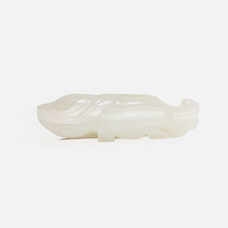 清 白玉鱼形珮 | A Chinese jade pendant Qing dynasty (1644-1911), in the shape of a fish