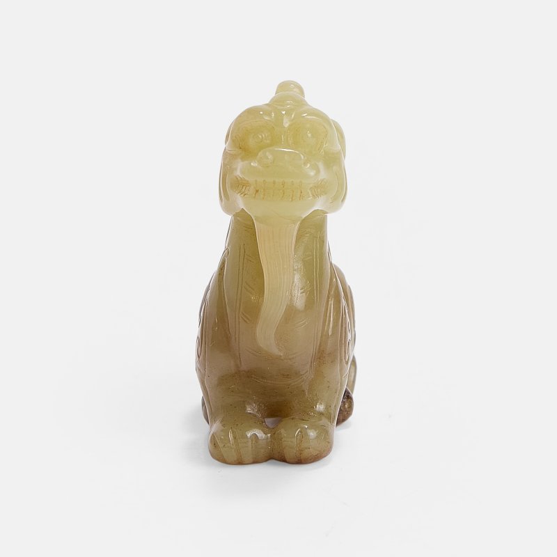 明 黄玉麒麟把件 | A Chinese jade carving Ming dynasty (1368-1644), of a qilin