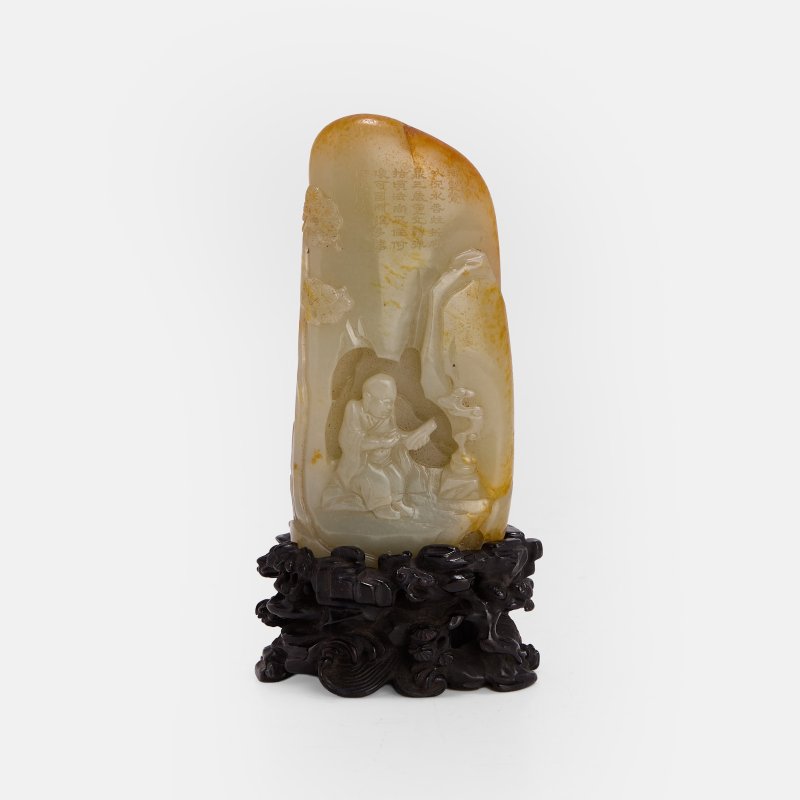 清乾隆 白玉诗题松下罗汉图山子 连木底座 | A Chinese jade boulder Qianlong (1736-1795), carved in high relief with a luohan seated in a cave reading a scroll beside an incense burner