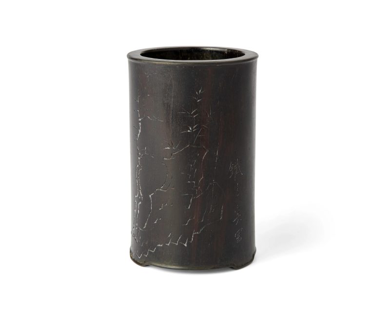 清十八世紀 紫檀雕山石竹紋筆筒，「鐵生奚岡」刻款 | A Chinese carved zitan brushpot by Xi Gang (1746 - 1803)