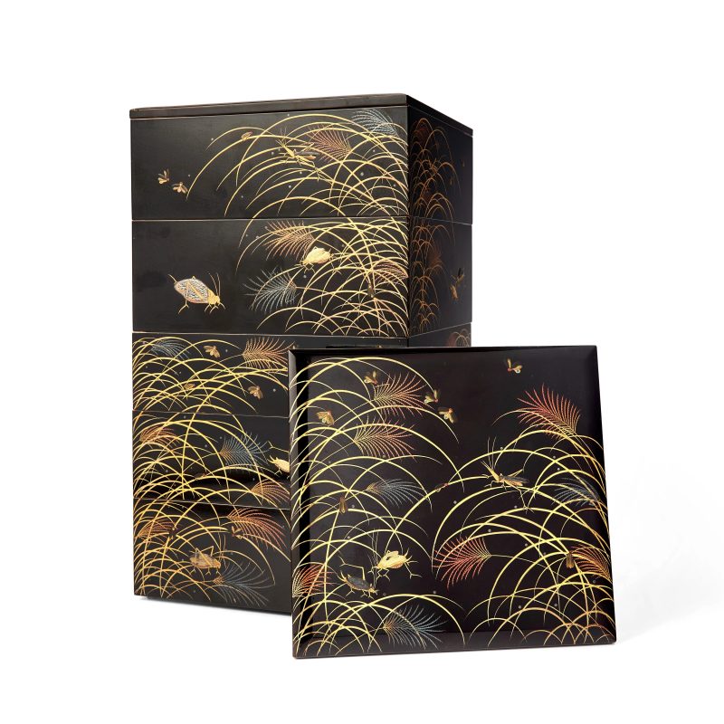 A Japanese lacquer five-tier picnic box and two covers, jubako