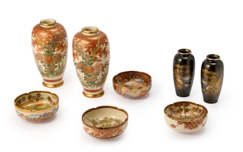 Six Japanese Satsuma wares and a pair of gilt metal vases