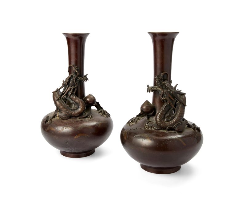 A pair of Japanese bronze dragon vases by Yoshida