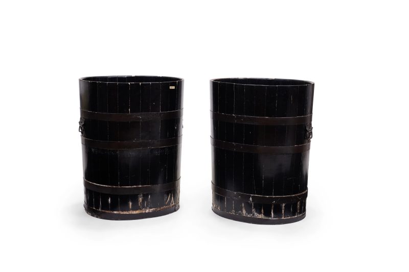 A pair of Japanese black lacquered barrels