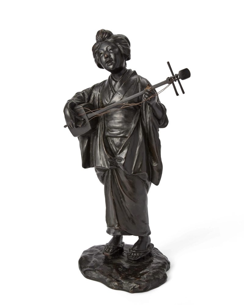 A Japanese bronze figure of bijin