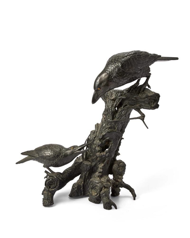 A large Japanese bronze 'bird and trunk' okimono
