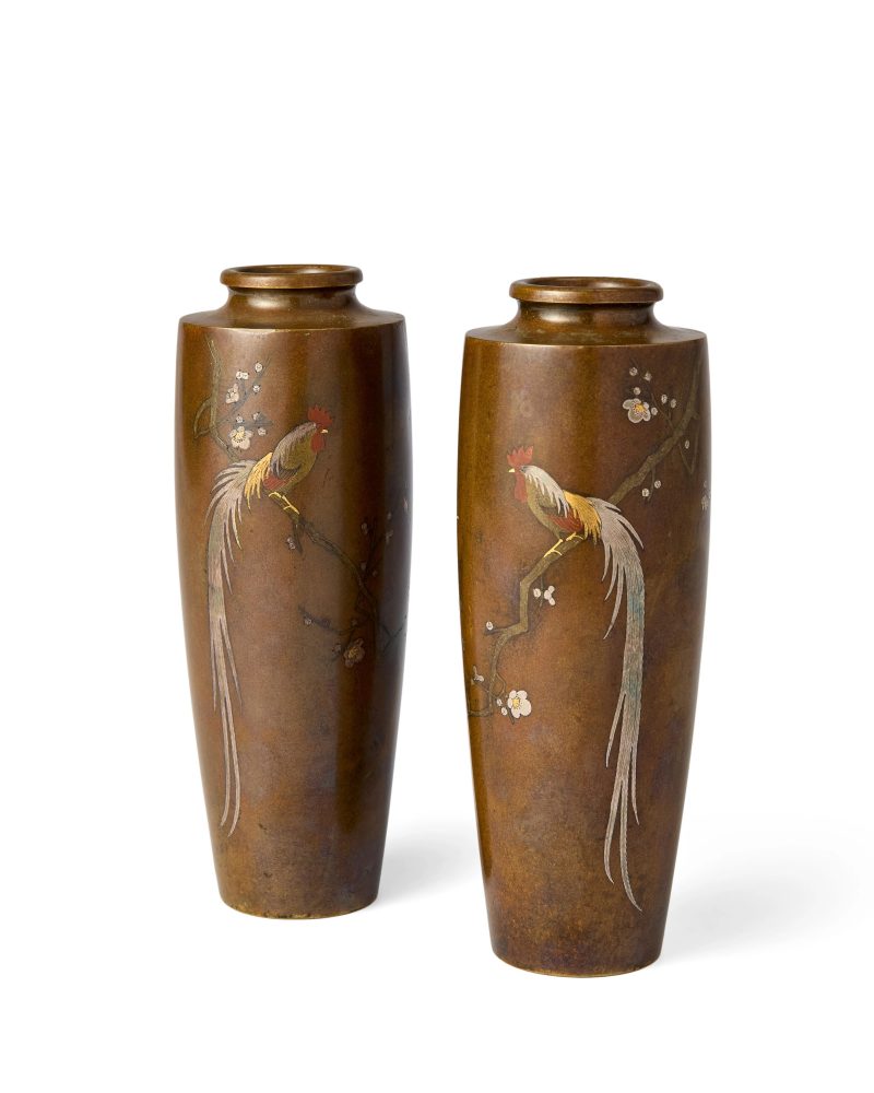 A pair of Japanese inlaid bronze vases
