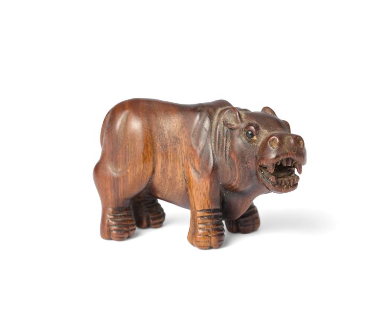 A Japanese wood netsuke of a hippo