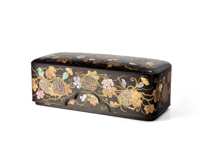 A Japanese mother-of-pearl inlaid lacquer writing box and cover, suzuribako
